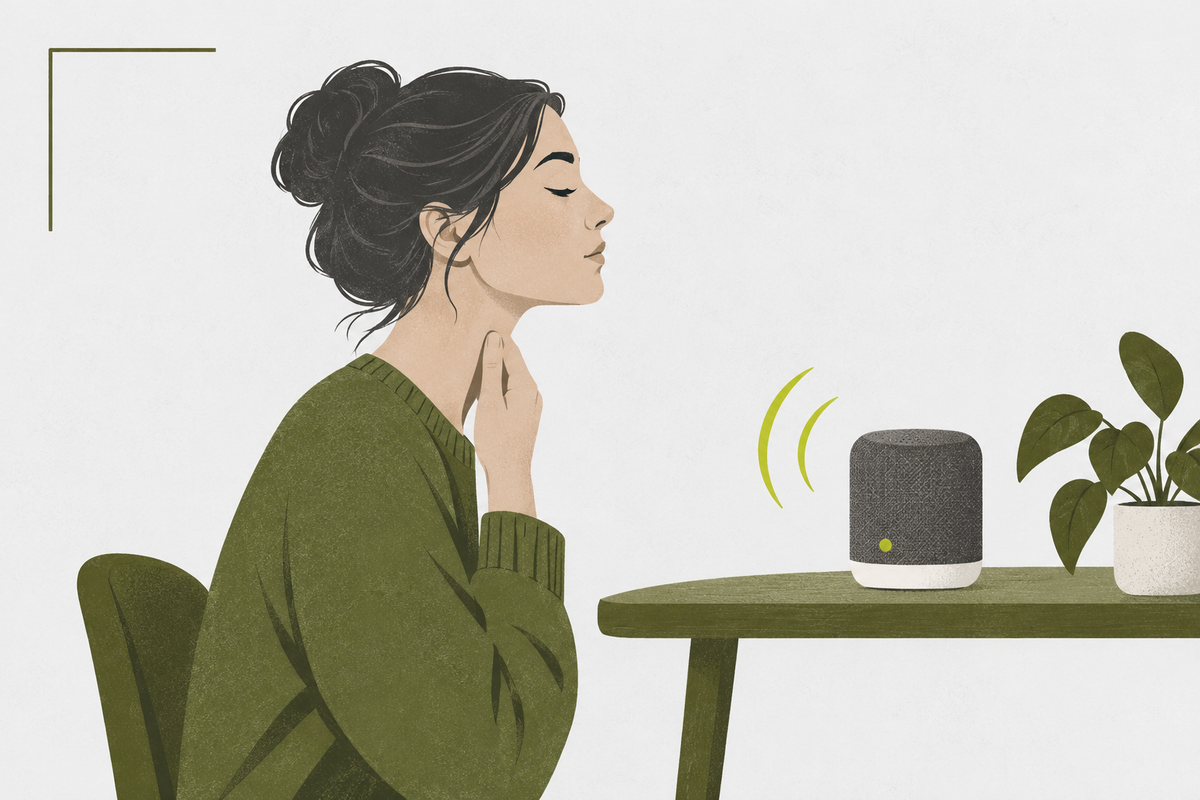 Adult listening to a small speaker while touching their throat to match a pitch.