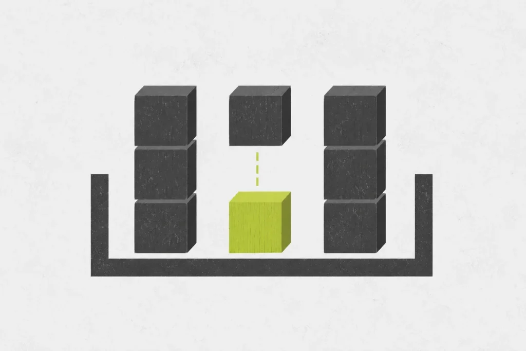 Three grouped charcoal block stacks with one green middle block shown in a lower position.