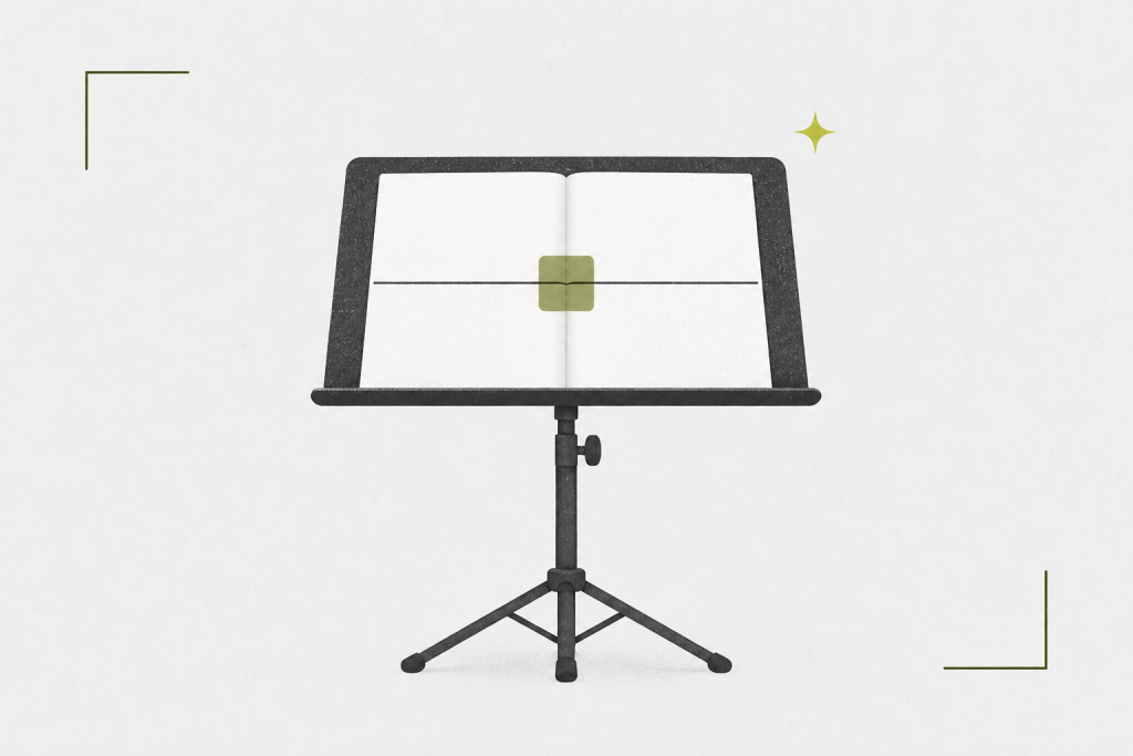 Open music stand with a two-layer practice sheet and an olive reading guide.